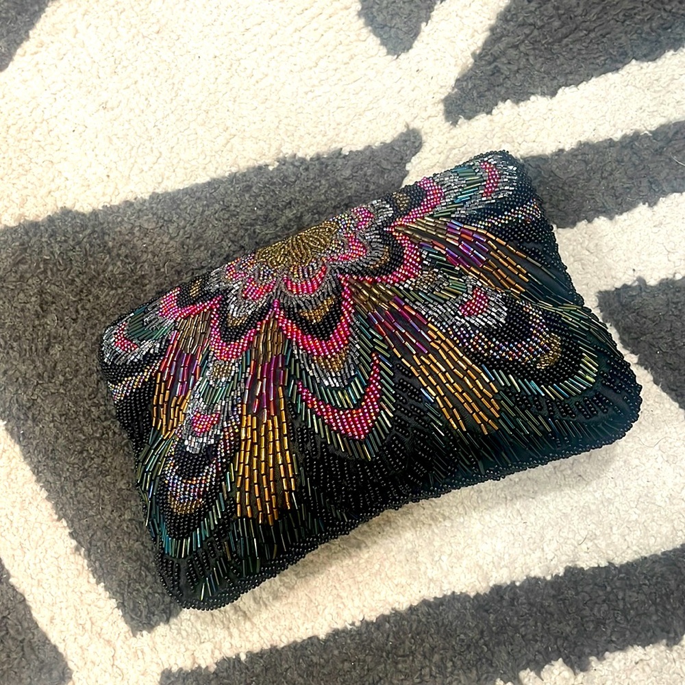 Beautiful multi jeweled color beaded bag on both sides!